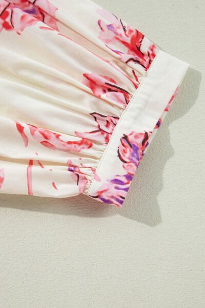 Robe à fleurs imprimée à manches trois-quarts et lien de serrage